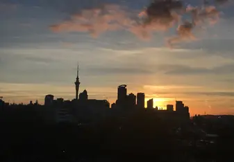 An unedited version of the city at sunset. Taken at a park about 20 minutes (walking distance) away. 