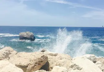 waves splashing against rocks