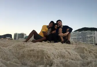 Friends watching Sunrise on Copacabana Beach 