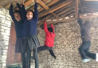 Class 3 learning the difference between and ceiling and a wall