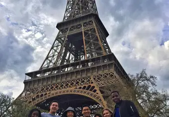 group photo under Eiffel Tower