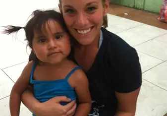 female volunteer with baby