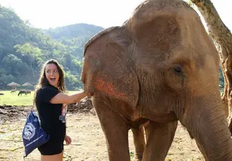young woman with elephant