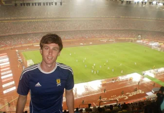 male portrait at the Bird's Nest Stadium