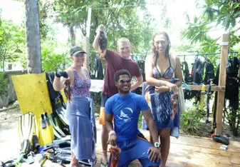 group photo holding fish
