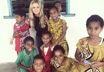 A photo of Alannah and some local Fijian children