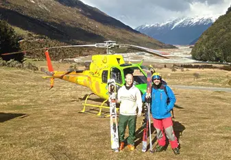 skiers with helicopter in New Zealand
