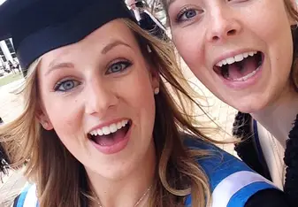 selfie in graduation gown