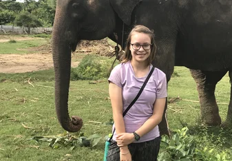 young woman with elephant
