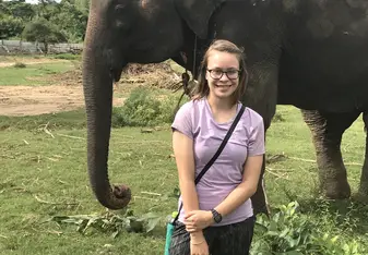 young woman with elephant