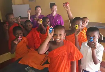 My friend and I with the young monks we taught