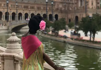 woman standing on bridge