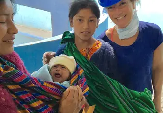 woman volunteering with family