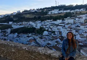 female portrait overlooking city