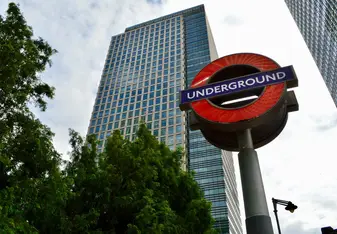 Underground sign with JP Morgan building in the background