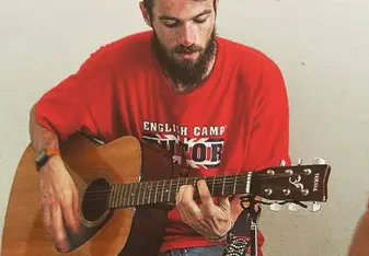 man playing guitar