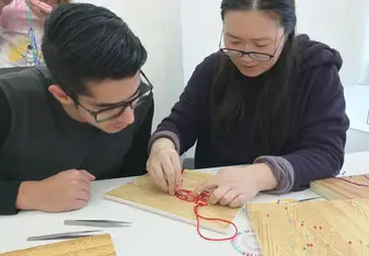 male and female student studying