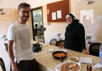 teacher and student in kitchen