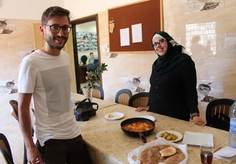 teacher and student in kitchen