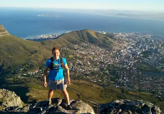 man hiking on top of a mountain