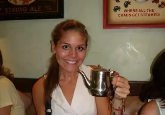 girl holding tea pot 