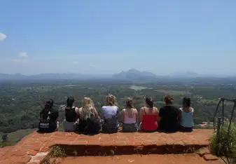 group photo overlooking land