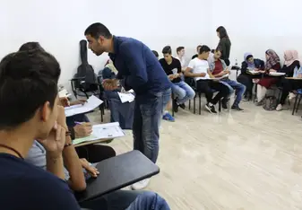 male teacher in classroom