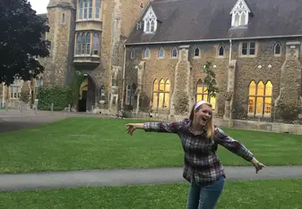 girl in front of building