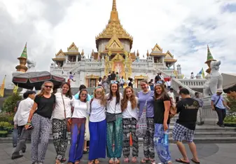 group photo at temple in Thailand