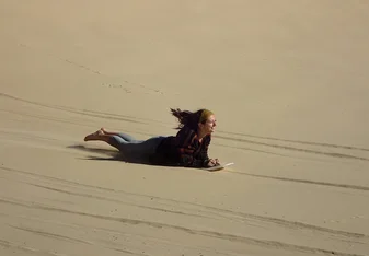 female sandboarding