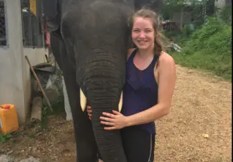female with elephant
