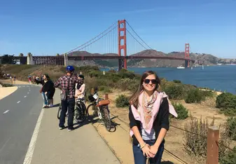 female photo in front of the Golden Gate Bridge in San Francisco