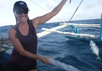 woman on fishing boat in Philippines
