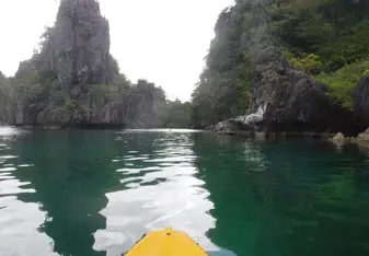 yellow kayak on water