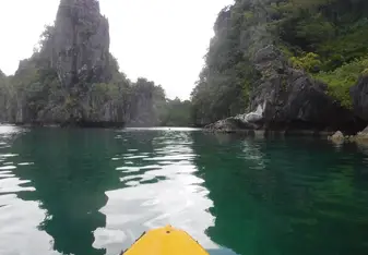 yellow kayak on water