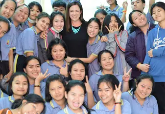 group photo of students and teacher