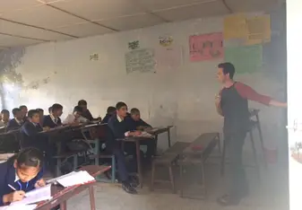 Volunteer teaching English