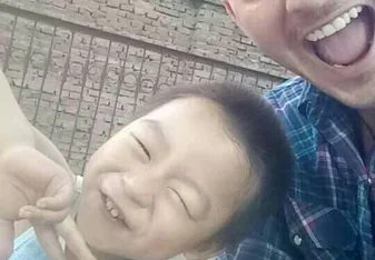 male teacher smiling with student in china