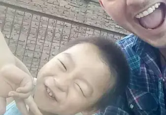 male teacher smiling with student in china