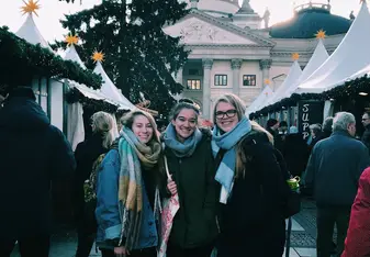 female group photo at Christmas market