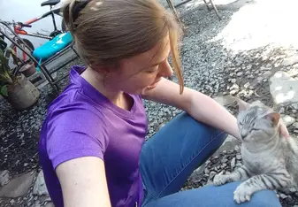Playing with beautiful kittens is one of the job duties!