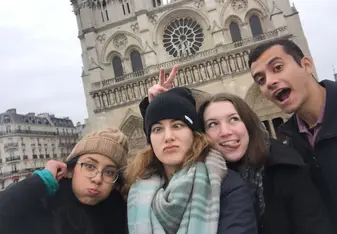 Funny faces in front of the Notre-Dame