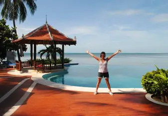 female portrait at resort pool