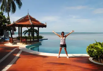 female portrait at resort pool