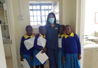Young girls waiting to receive treatment