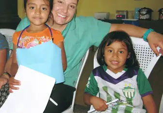 dentist with two young patients