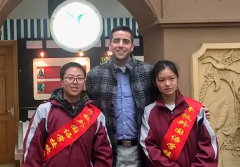 teacher with two students