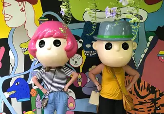 women with cartoon heads