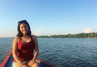 photo of woman on boat