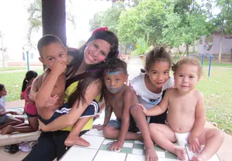 woman with group of children.